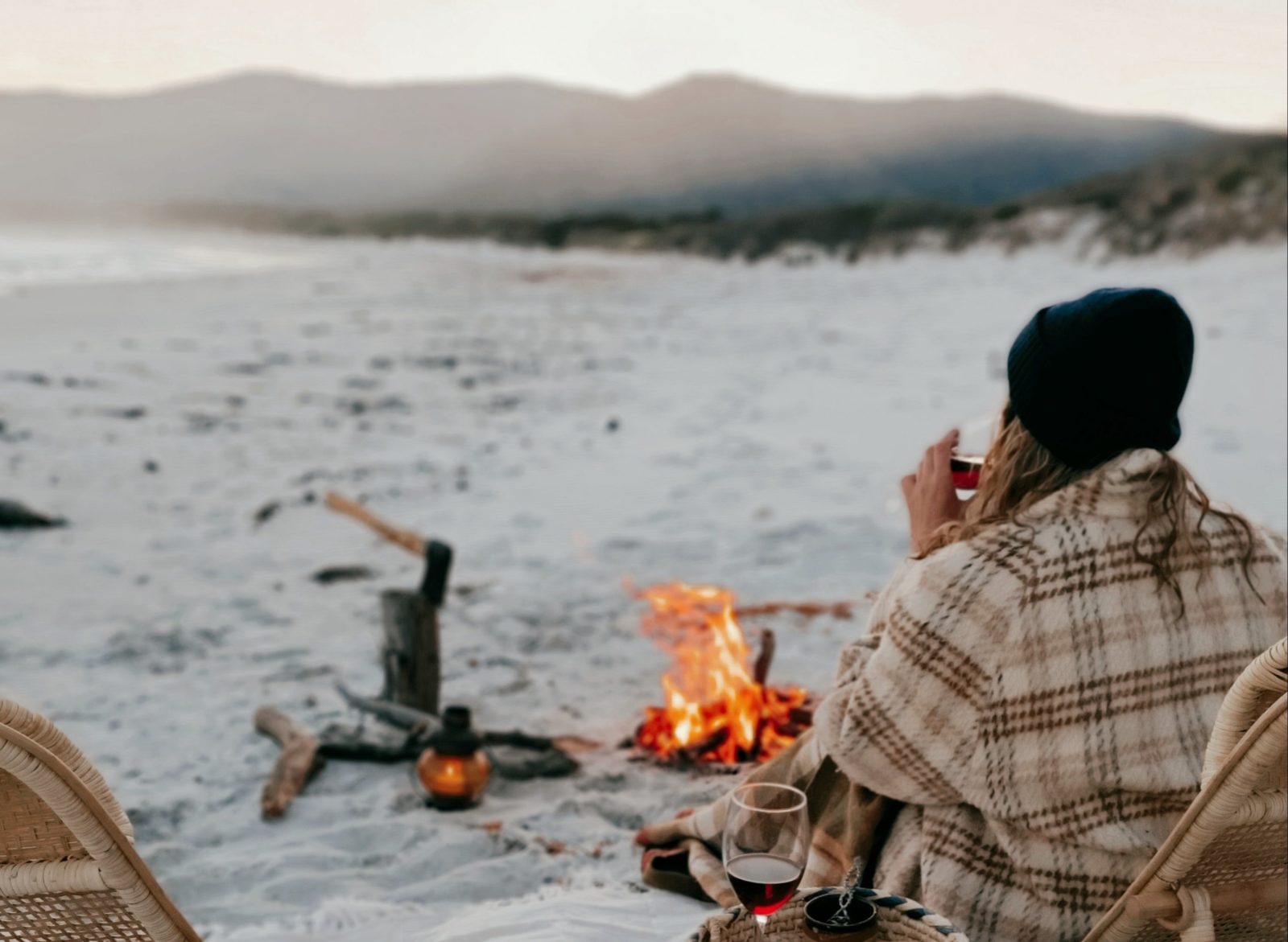 A picnic on the beach with a firepot