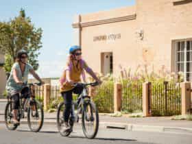 Cycling past Longford Antiques