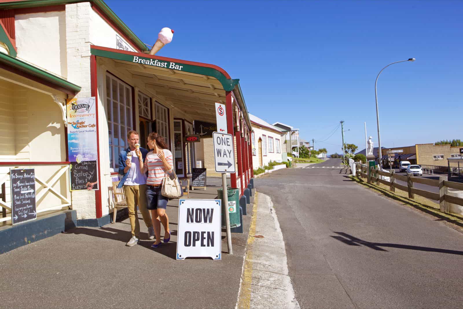 A couple walking down the street in Stanley
