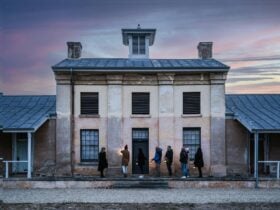 Guests walking in front of the Barracks at Willow Court