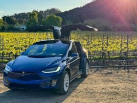 EVRide Tesla Model X at Home Hill Winery with falcon-wing doors open