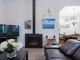 Cosy up in the fireplace lounge at Cawarra Ski Club