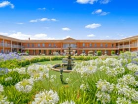 Exterior and garden with water fountain in centre