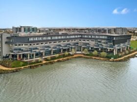 3 story hotel by lake