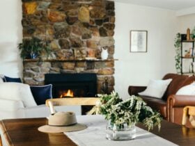 Stone fireplace, generous and comfy sofas, country farmhouse