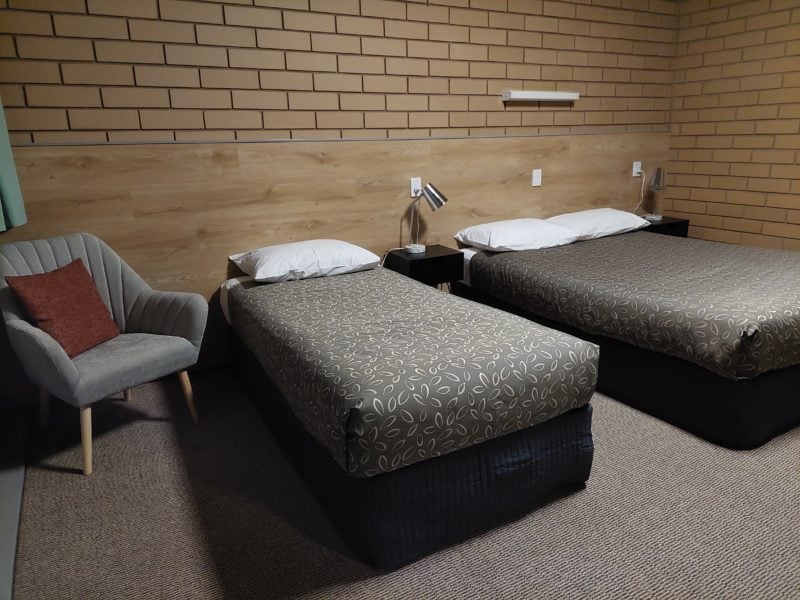 Queen bed, plus one single bed in room