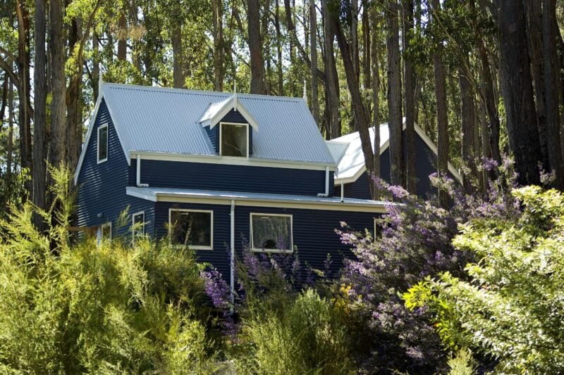 A cottage hidden amongst the spring flowers.