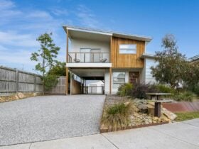 Image of two storey house on large block