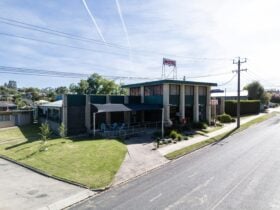 a picture of the front of the motel