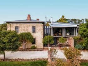 Enter though the double story entrance of Vale House house