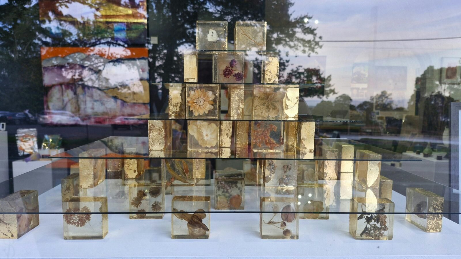 Statis by Karly Michelle Edgar in the window of Art & Alchemy Gallery & Studio