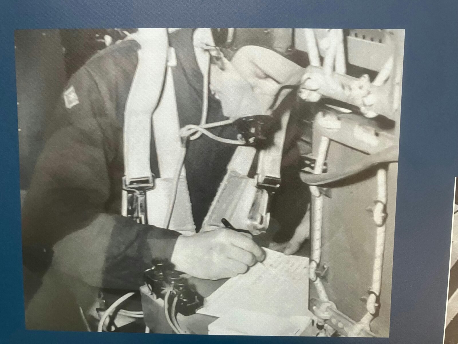 Airmen in an aircraft recoding message by Morse Code