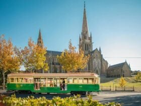 Vintage Talking Tram in front of Cathedrak
