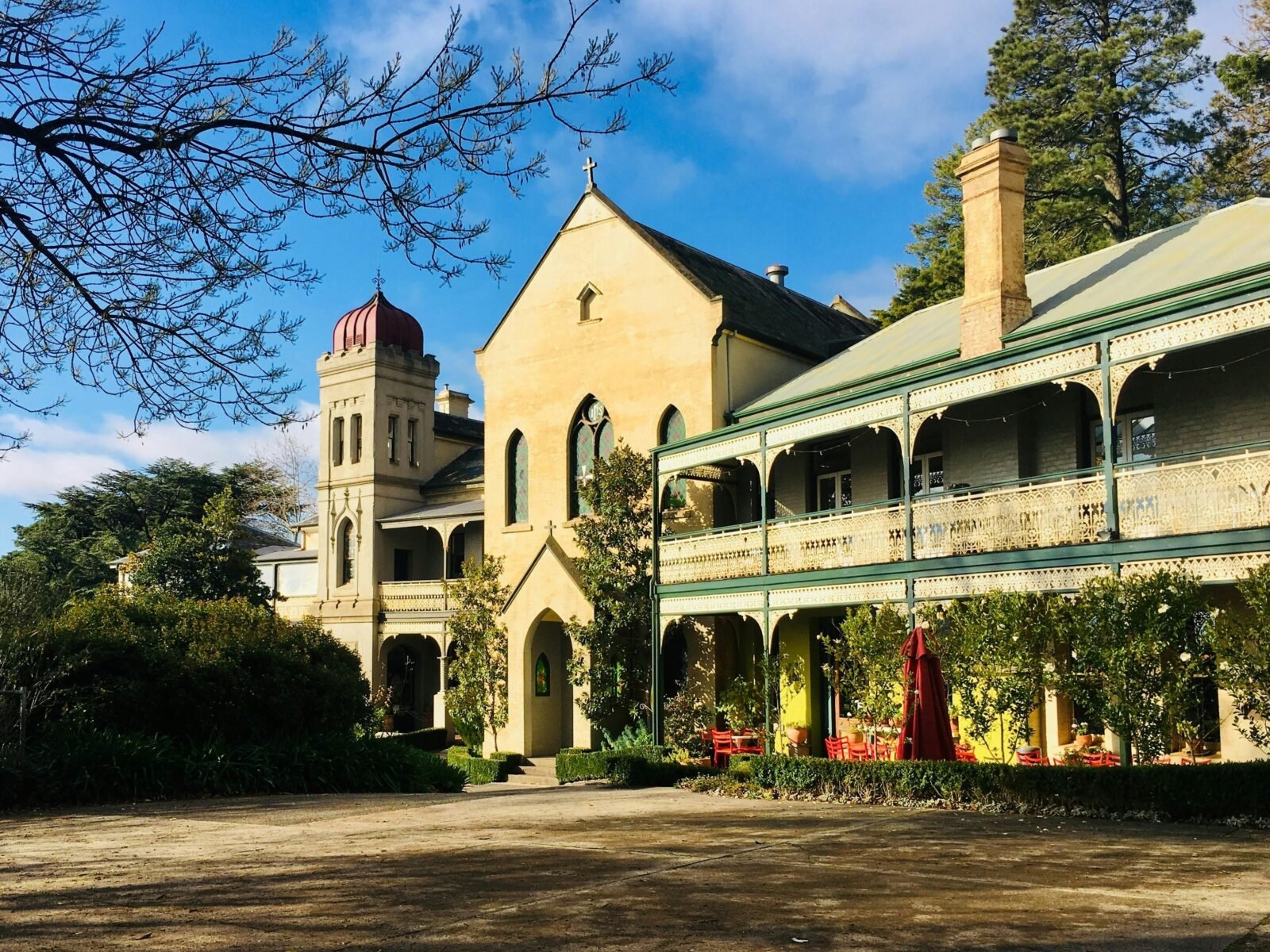 external facade of the convent including the chapel, tower and bar.