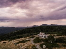 Hut with mountains in background