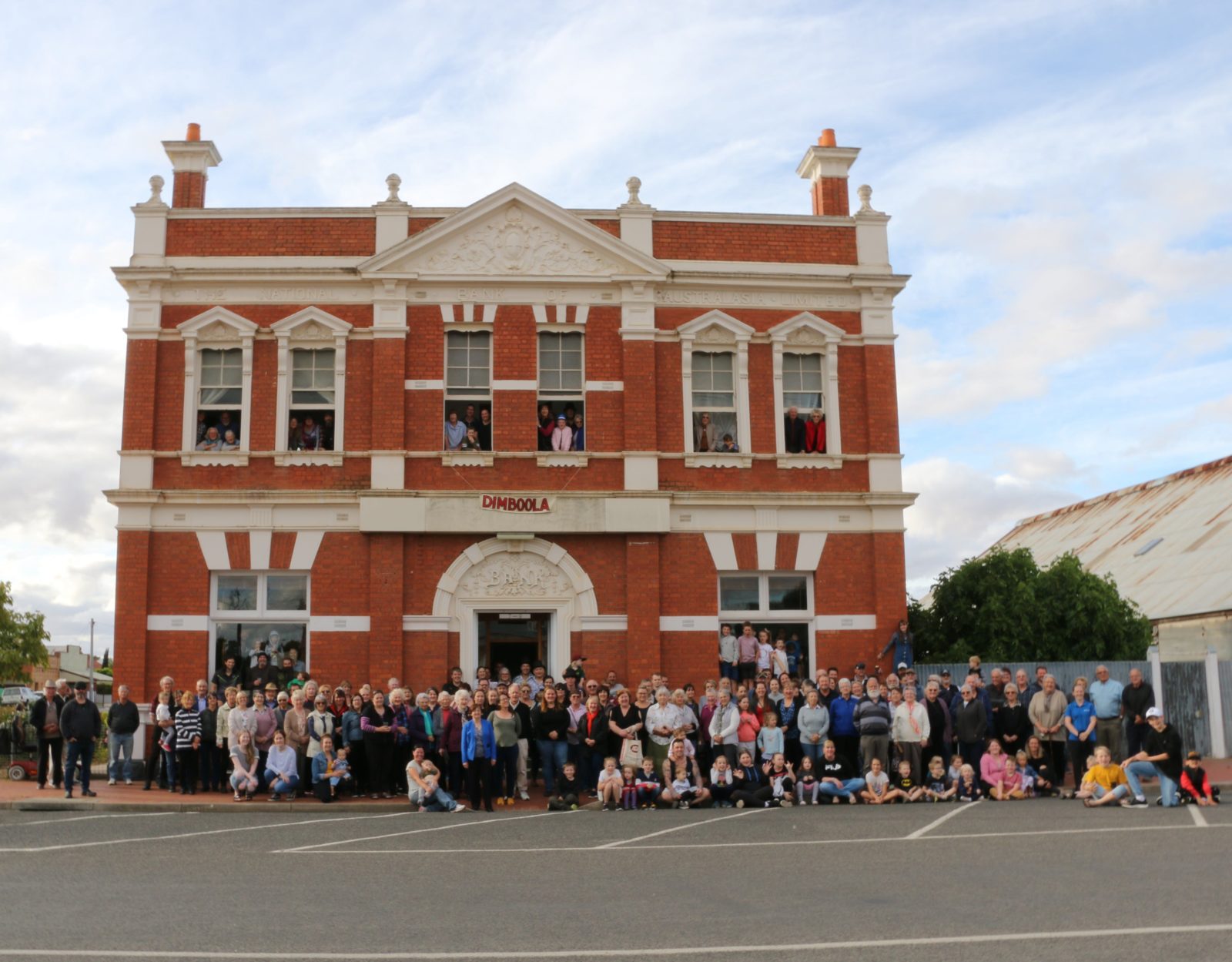 250 Dimboola locals assemble in front of the former National Bank of Australasia building.