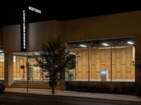 Facade of contemporary art gallery at night time.