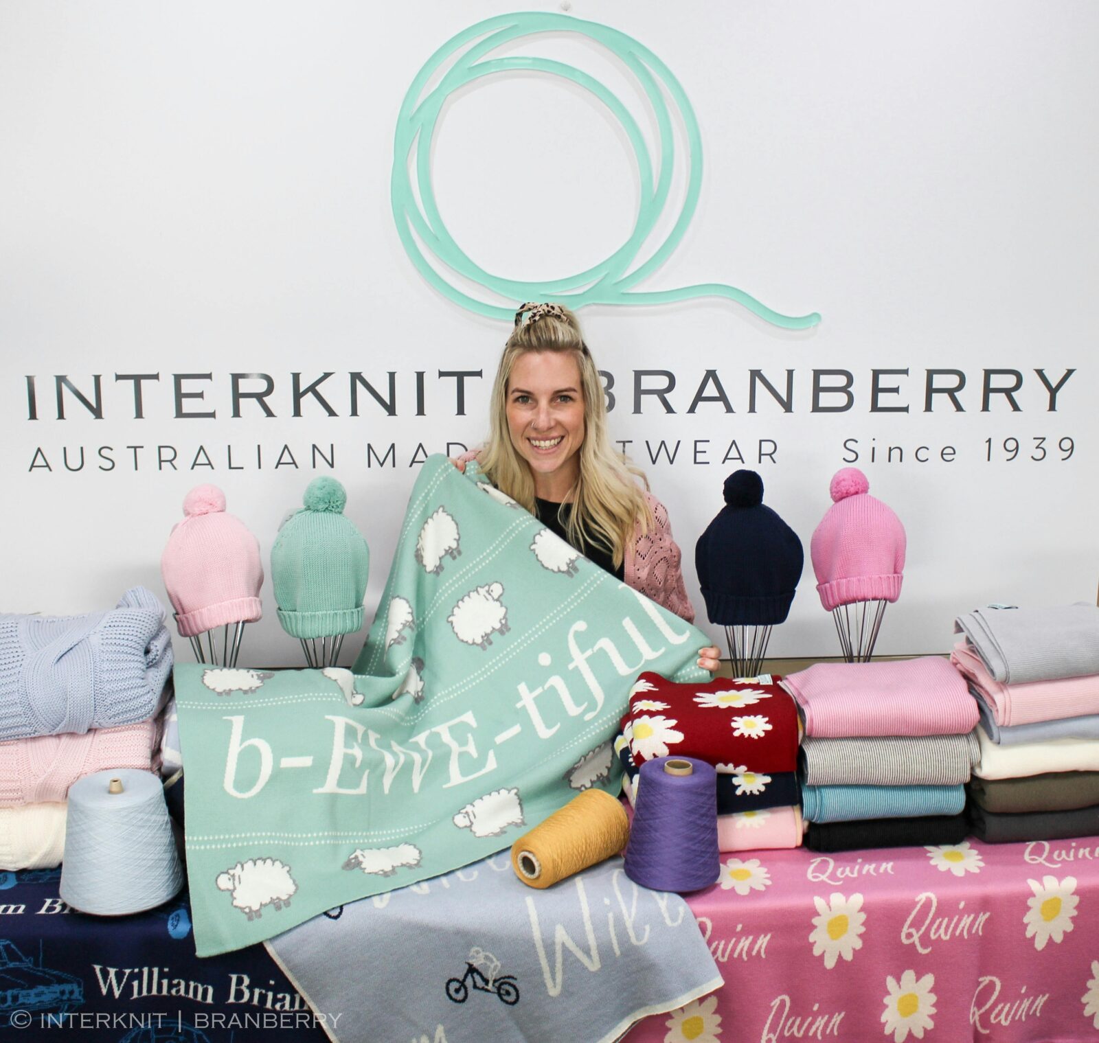 Owner of the business with some bright woollen knitwear