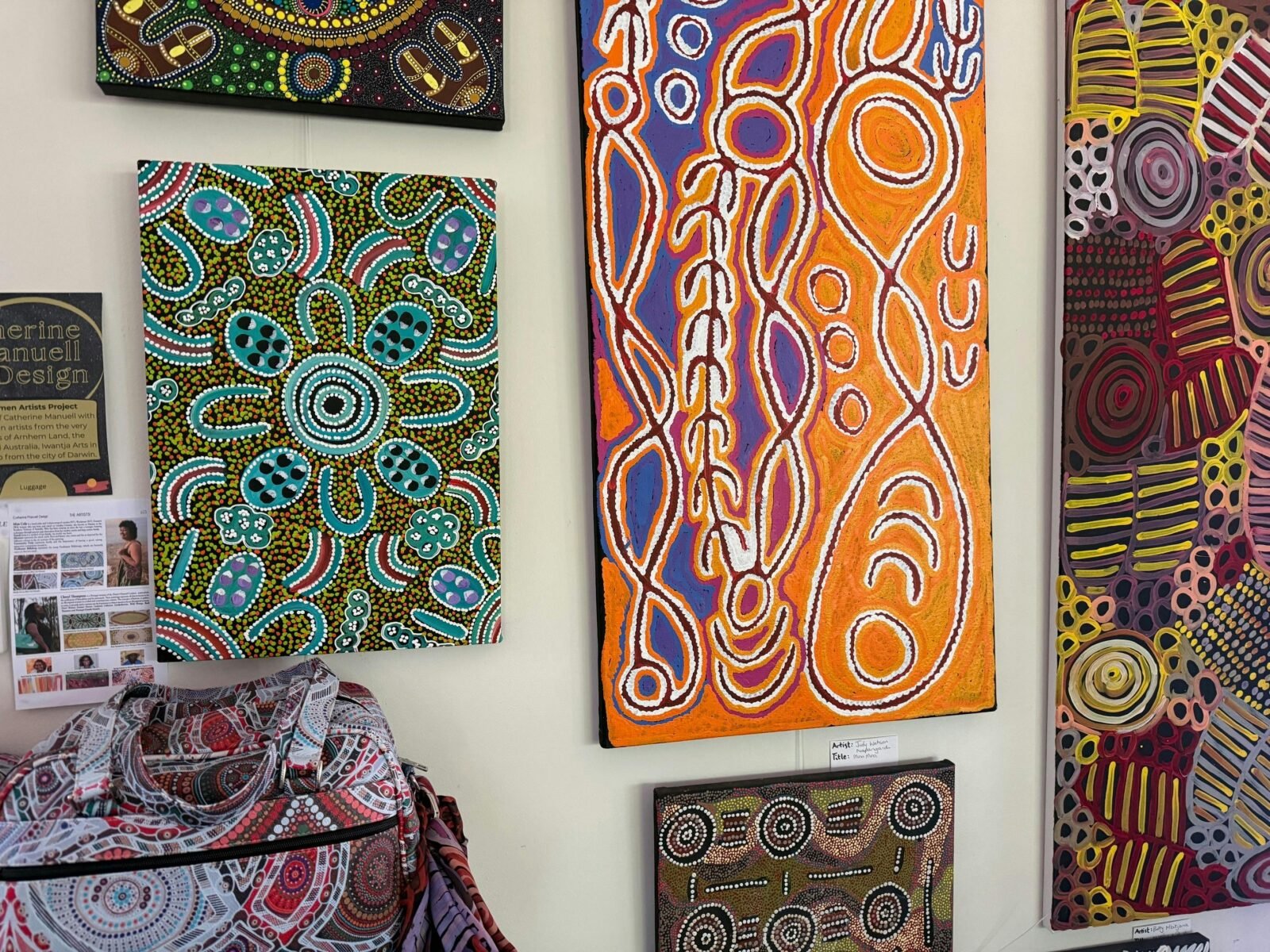 paintings hanging on a wall
