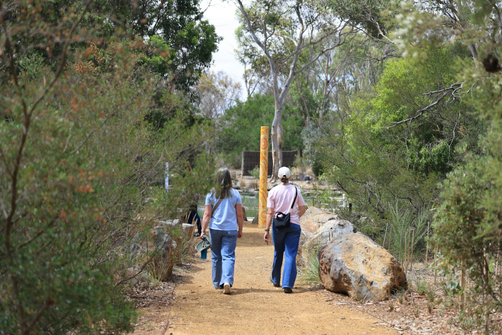 Strolling towards the Sensory Garden to discover the five sensory spaces in nature.