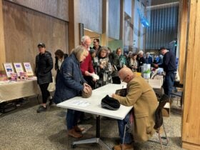 People line up for book signing