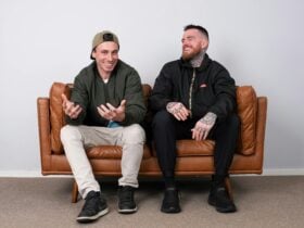 the rapper pez and 360 sitting together on a couch