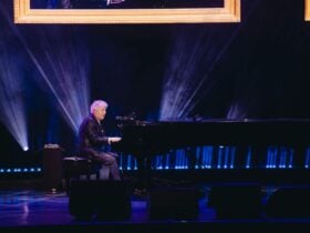 Alan Menken performing at the Piano during concert