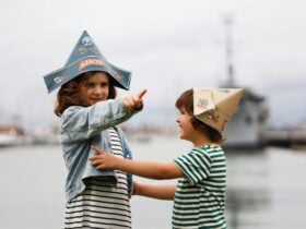 Children wearing Ahoy Williamstown pirate hats playing in Commonwealth Reserve.