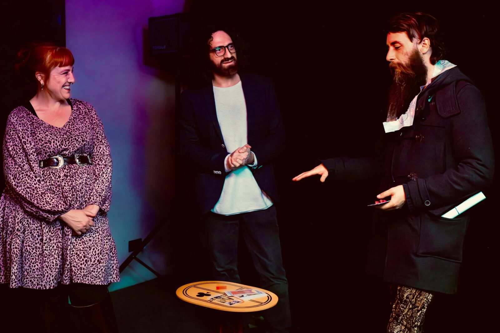 Davide performs with two spectators on stage