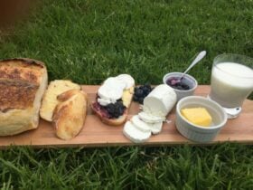 images of board with cheese, bread and preserves