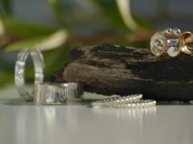 Sterling silver rings on a piece of wood