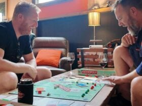 Hadyn and Darcy playing Monopoly at the Wine shed