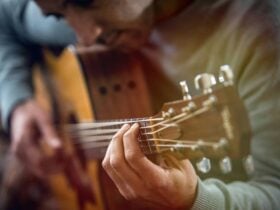 close up of guitar player