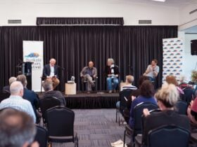 panel discussion in front of crowd