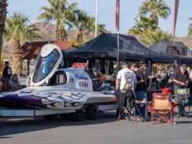 Problem Child Top Fuel Hydro Drag Boat on display at a drag boat racing event.