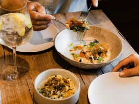 Plates of food with a cocktail