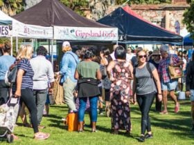 market goers enjoying the range of market stalls