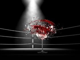 A wine glass is exploding inside a boxing ring