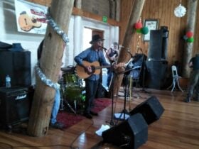 a man performing at the Country Music Club
