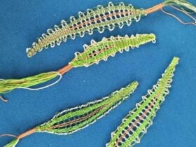 Leaf embroidery on blue fabric