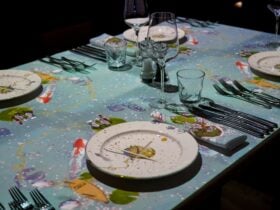 Le Petit Chef Japan, plates glasses and cutlery placed on a table with images projected on it