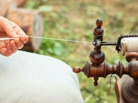 Spinning yarn on wheel