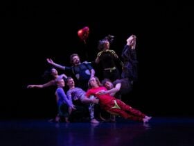 The Dancenorth Ensemble striking a vivid pose