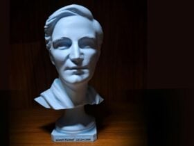 A light blue 3d Printed bust of queer poet Alieen Palmer