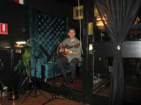 Man holding a guitar