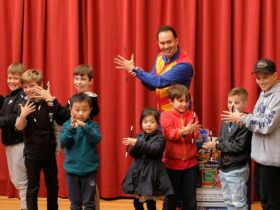 Children learning magic tricks with Tim Credible at a kids magic school workshop in Melbourne school