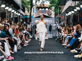 Model walking a runway in middle of Little Bourke Street