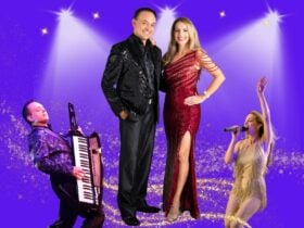 Duo performers in formal wear on stage