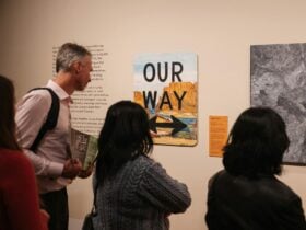 Visitors viewing artwork in the Burke Gallery