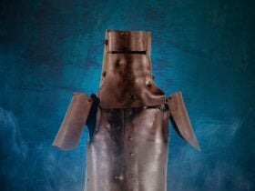 The iconic Ned Kelly armour on a mottled dark blue background